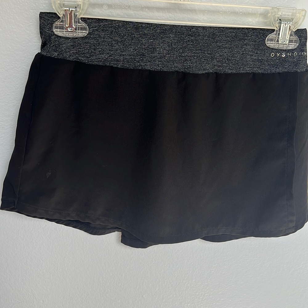 Tennis skirt with compressive shorts underneath